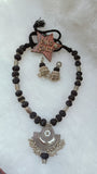 Black Cotton Set In Silver Pendant
