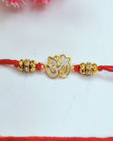 Golden Om Rakhi (Set Of 2)